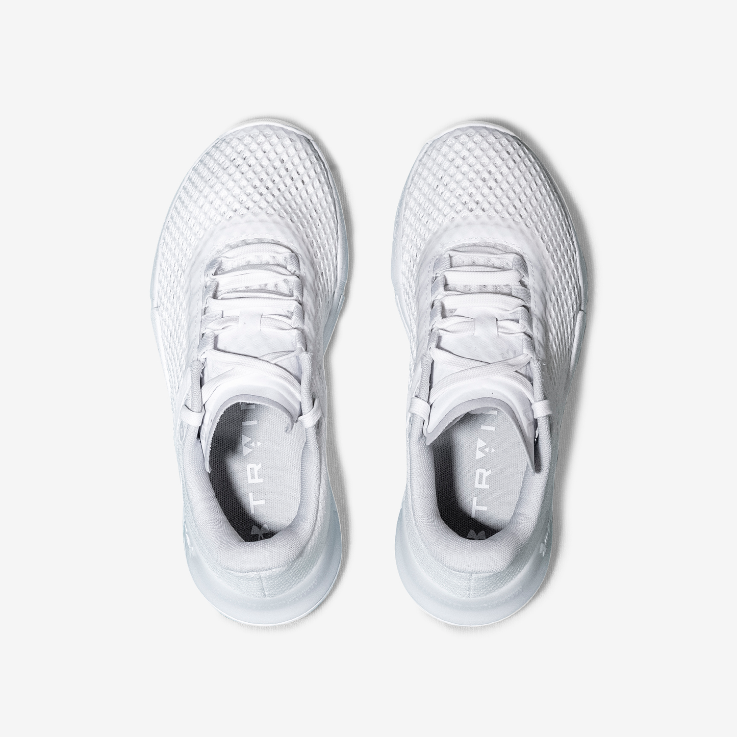 UNDER ARMOUR TRIBASE REIGN 4 - MUJER 3025053-100