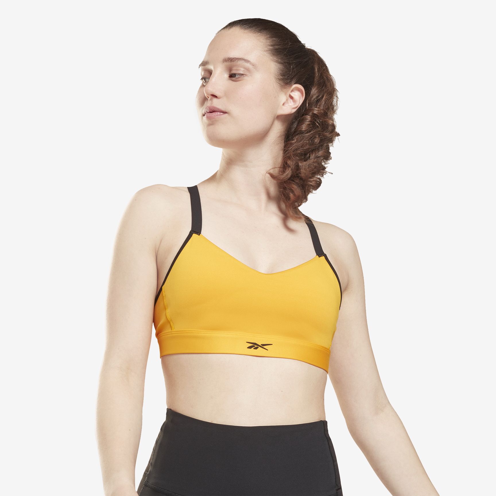 TOP REEBOK LUX STRAPPY - MEDIUM IMPACT JIP32-GU5859